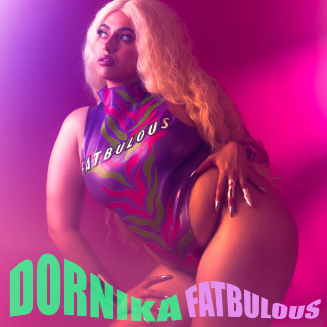 Dornika cover artwork; Dornika wearing blonde wig and leotard with amazing nail art